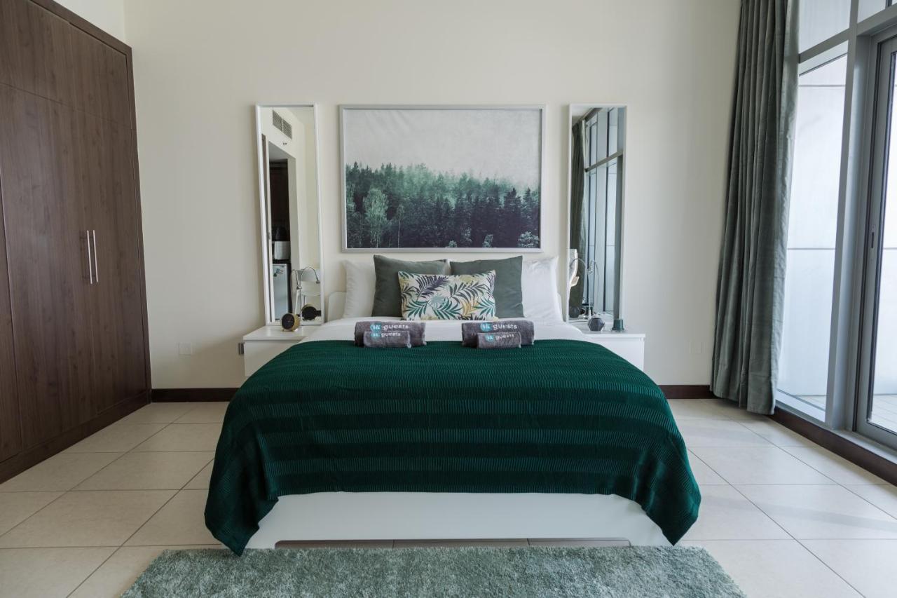 Higuests - Cozy Studio With Panoramic Views On The Lake Apartment Dubai Bagian luar foto