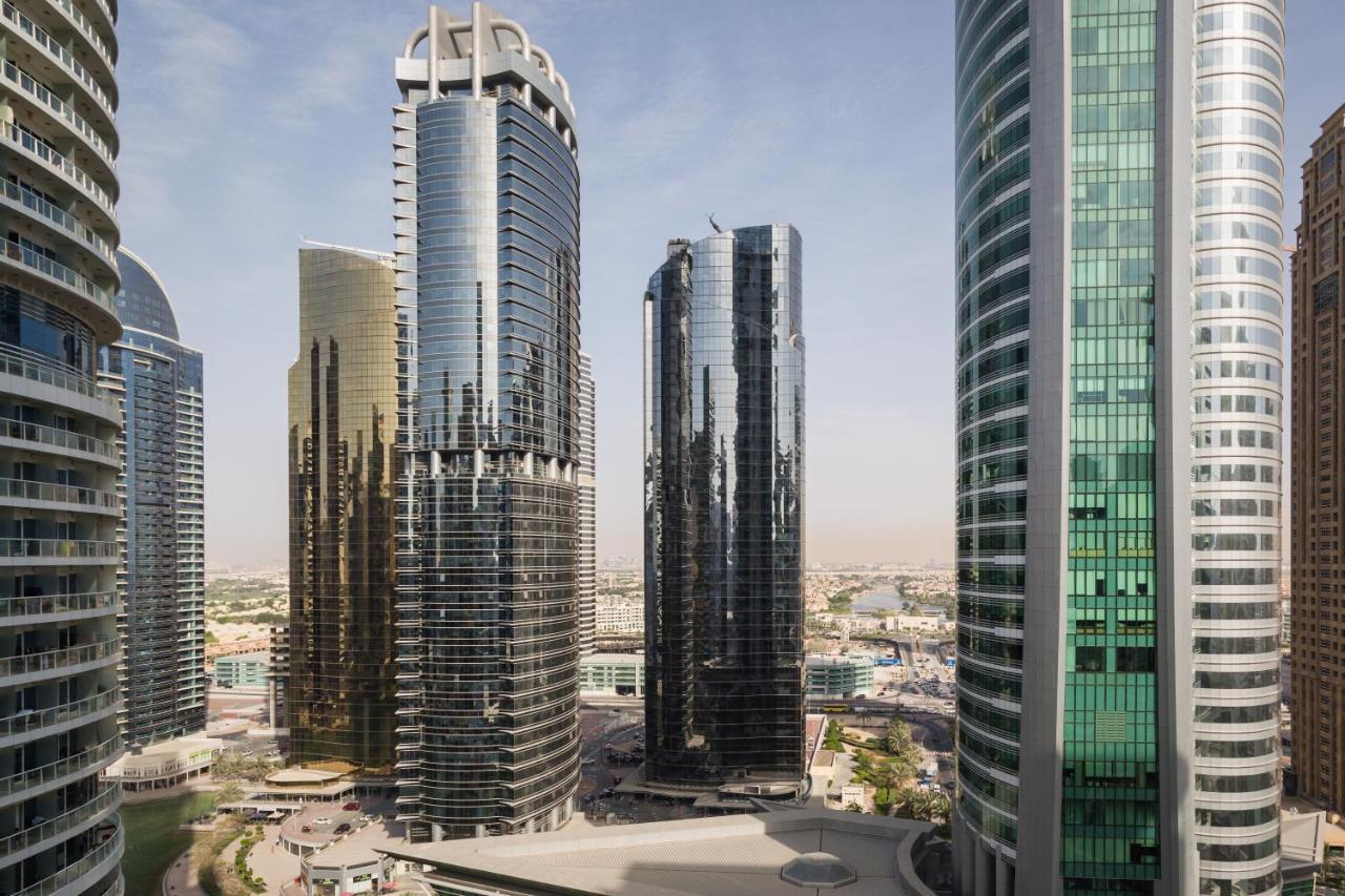 Higuests - Cozy Studio With Panoramic Views On The Lake Apartment Dubai Bagian luar foto